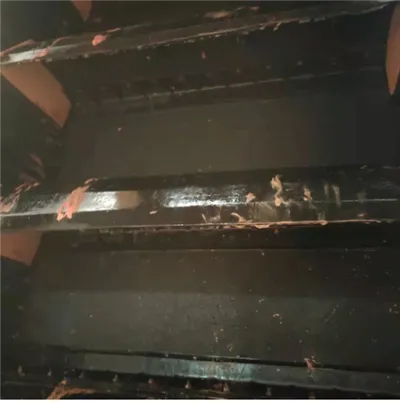 Anti-klæbende korrugeret sidevægstransportbånd